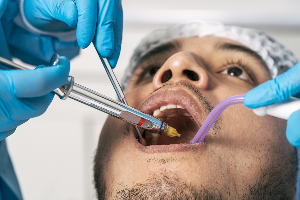 dentist39s-hands-injecting-anaesthesia-into-patient39s-mouth-dental-clinic